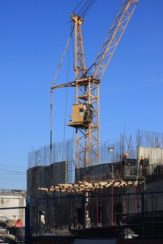 Building, the house, the crane, workers, builders, people, group, armature, concrete, a structure, a construction, a city, business, building, the real estate, the sky, day, spring