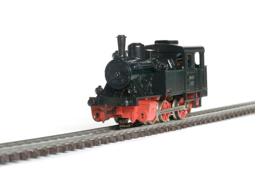 Vintage western model railway over white background