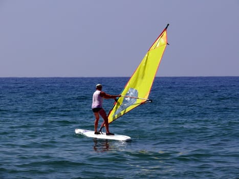 Windsurfer in the mediterranian sea