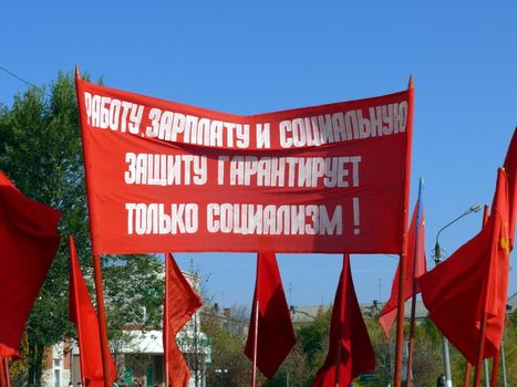 Old communistic flags with slogans