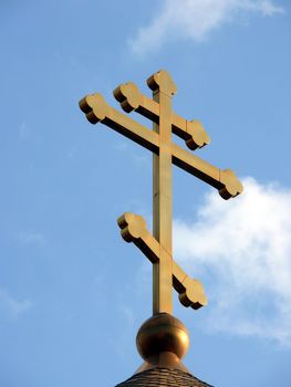 Ortodoxal cross in the blue sky background