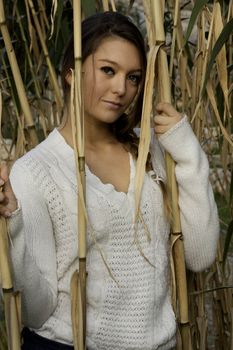 View of a beautiful blond woman posing on a fashionable way.