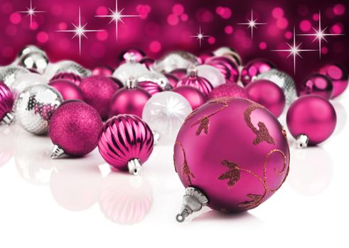 Pink decorative christmas ornaments with star background