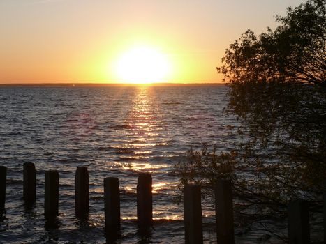 Golden romantic sunset in the lake