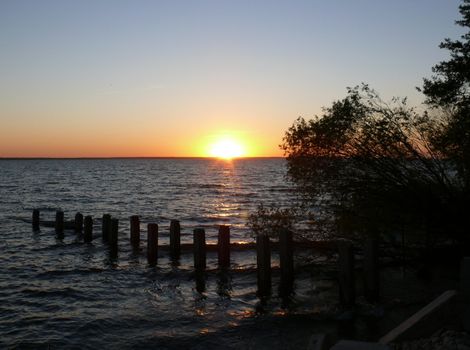 Golden romantic sunset in the lake