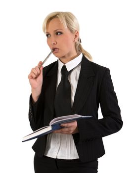 Thoughtful young woman with organizer and a pen against white background.