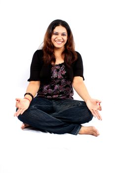An Indian woman in a laughter therapy meditation.