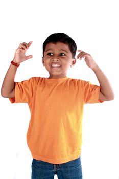 A happy Indian kid, isolated on white background.