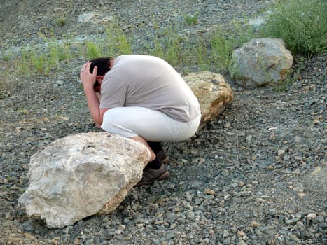 man pretending to be a stone