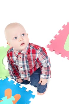 Studio shot of little boy, isolated on white