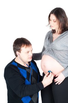 Shot of beautiful couple, pregnant woman isolated on white