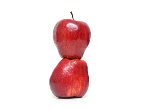 Two red apples isolated on the white background