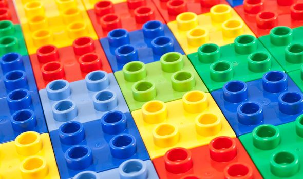 Background of plastic building blocks.  Bright colors.