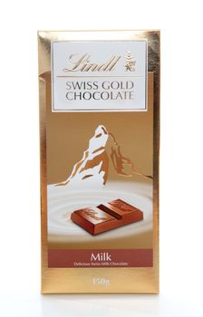 Lindt premium Swiss Gold chocolate bar 100grams.  Milk chocolate.  Editorial Use Only.  White background.