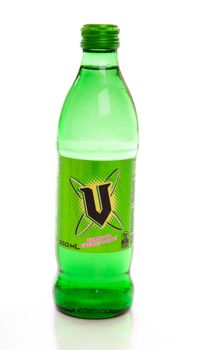 Glass bottle 350ml  of V - a carbonated energy drink containing guarana , caffeine and vitamins