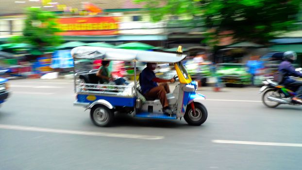 Moving tuk-tuk at Bangkok