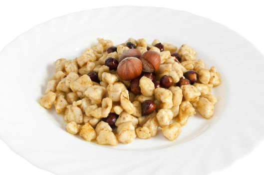 dish with chicken and nuts with curry sauce