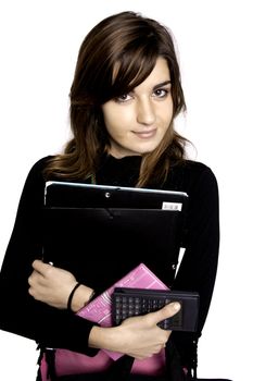 View of a teenager school girl holding books on a white background.