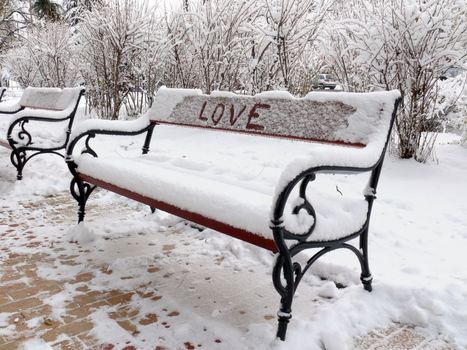 Bench of love with snow in Sofia, Bulgaria