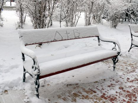 Bench of love with snow in Sofia, Bulgaria