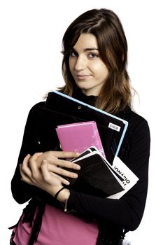 View of a teenager school girl holding books on a white background.