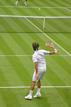 London, UK - June 26th 2006 - Rodger Federer vs. Richard Gasquet play in Wimbledon, London, England on June 26th 2006 in the 1st Round. Federer went on to win the Match and the Wimbledon Title.