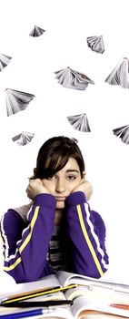 View of a teenager school girl looking at the camera with an upset expression.