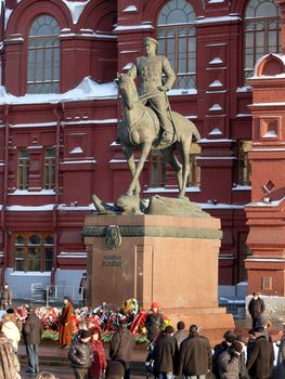 Moscow, Russia - February 23, 2010: Winter day. Peoples walks near monument of Marshal Zhukov in Moscow, Russia