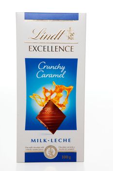 Lindt Crunchy Caramel fine milk chocolate bar 100g.   White background.  EDITORIAL USE ONLY.