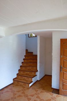 House reception and staircase with smaill window