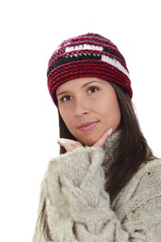 Young woman wearing knitwear clothes isolated against a white background.