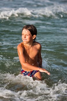 people series: swimming boy on sea beach