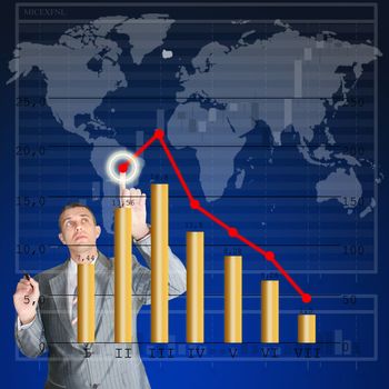 The businessman studies a structure of the diagramme of capital investments in financial business