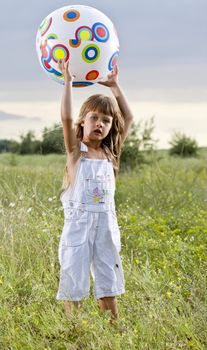 people series: little girl on summer meadow