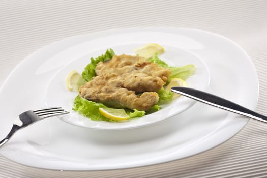 food series: freshfried fish with lettuce and lemon