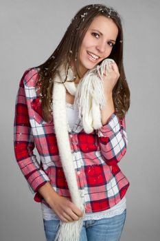 Pretty smiling winter scarf girl