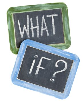 what if question - white chalk text on two vintage slate blackboards, isolated on white