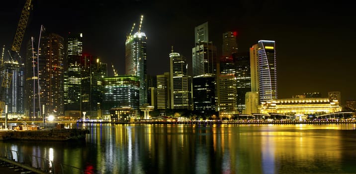 Construction by Singapore River Skyline at Night Panorama