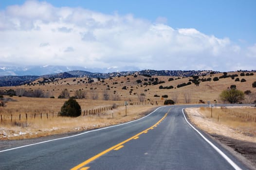 Road curves around the mountain