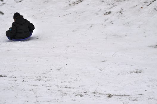 Sledding down the hill - background