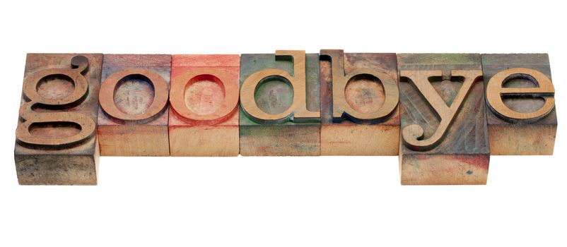 goodbye or farewell concept - isolated word in vintage wood letterpress printing blocks, stained by color inks