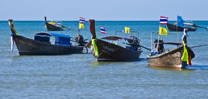 thai long boats in the Andaman Sea