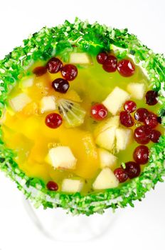 fruit jelly dessert with apple, kiwi, berry and orange
