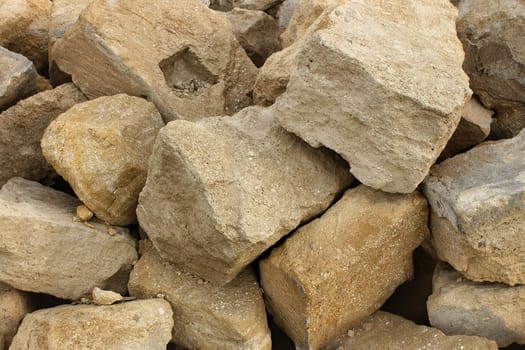 Heap big limestone. The stones used in construction