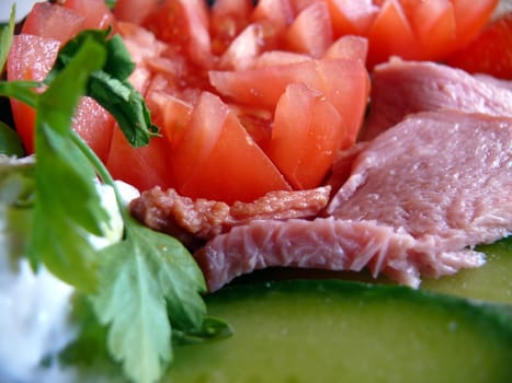Salad with tomatoes, cucumbers and ham