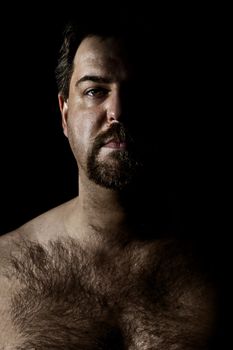 An image of a hairy man in a dark style