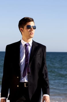 Close up view of a bunisess man in a dark suit. 