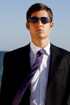 Close up view of a bunisess man in a dark suit.