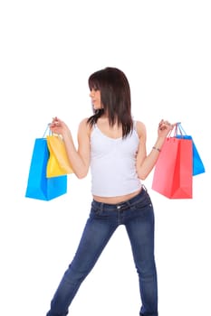 Beautiful, young, woman with colorful shopping bags in her hand 