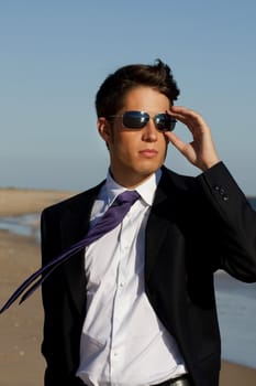 Close up view of a business man with glasses.